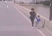 IMÁGENES FUERTES: Chofer de autobús salva a niño, su mamá iba a arrojarse de un puente con él